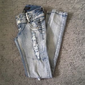 Women’s distressed embroidered jeans